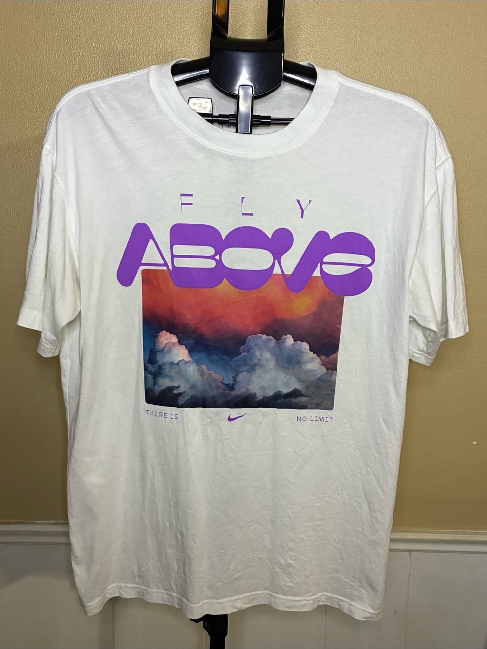 Nike White Short-Sleeve Tee with Purple 'ABOVE' Graphic and Sunset Cloud Print